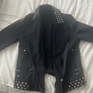 Studded black denim jacket